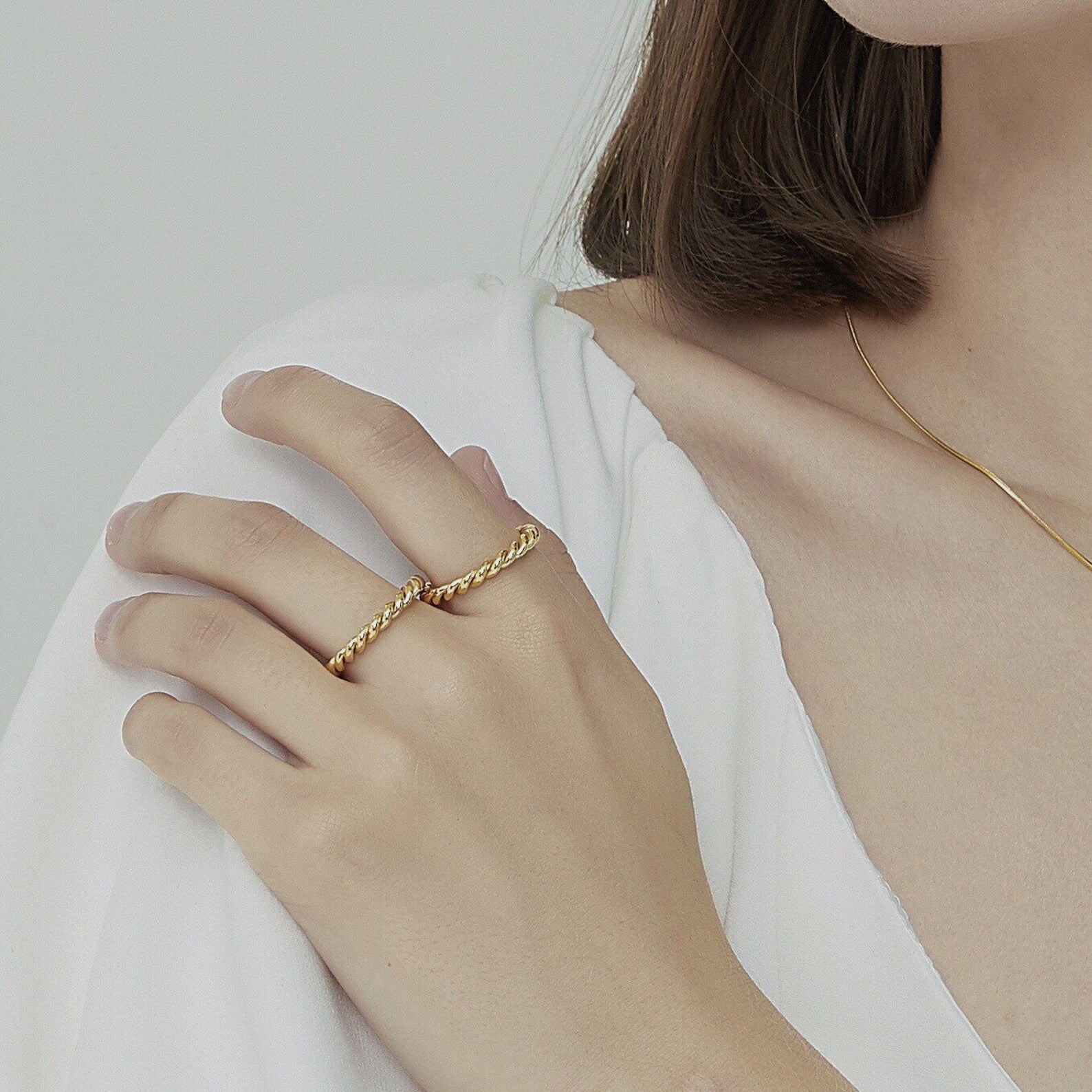 Melody Twist Ring | 18k Guld